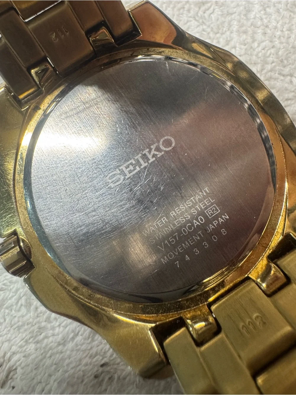Seiko Gold-Tone Watch with Black Dial and Crystal Accents